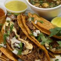 Quesabirria Tacos · 3 All Beef Birria Tacos with a cup of Consome
comes with cilantro, onions and cheese
