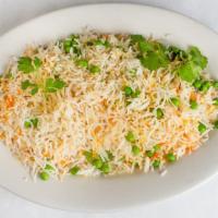 Peas Pulao · Basmati rice cooked with green peas and cumin.