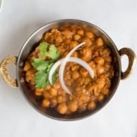 Chana Masala · Chick peas cooked in a mildly spiced onion and tomato gravy.