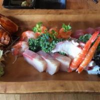 Sashimi Platter · Chef's selection of 8 pieces of sashimi and your choice of any basic maki.