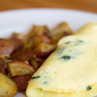 Spinach Feta Omelette · Served with dressed greens and corn bread.