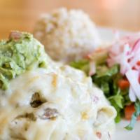 Enchiladas Verdes · Corn, potato, and sour cream enchiladas topped with jack cheese, guacamole and salsa verde (...