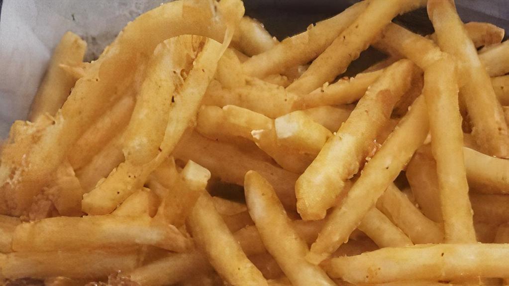 Curbin' Fries · Fresh golden crispy fries with our signature seasoning blend.