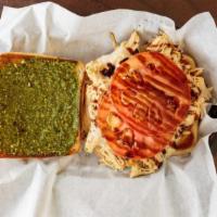 The Margherita Sandwich · Roasted pulled chicken, tomatoes, mozzarella cheese, basil pesto and balsamic glaze on a cia...
