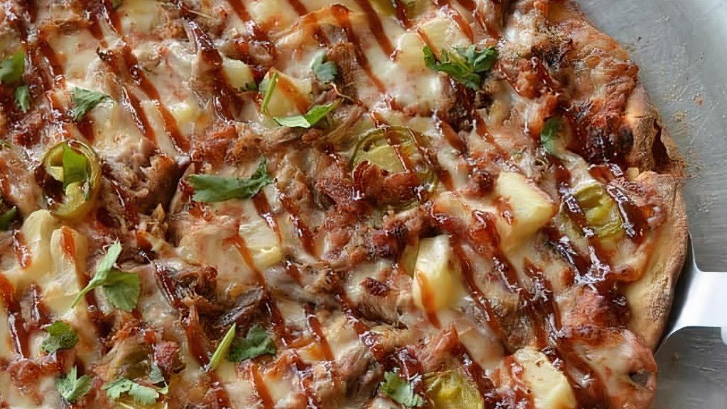 Large The Hawlowan Pizza · Red sauce with mozzarella, pineapple pulled pork w/bacon, jalapenos, cilantro with BBQ drizzle.