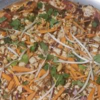 Large The Muy Thai Pizza · Red sauce with mozzarella cheese, chicken, matchstick carrots, cilantro, red onion, bean spr...