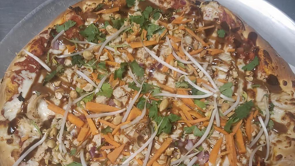 Medium The Muy Thai Pizza · Red sauce with mozzarella cheese, chicken, matchstick carrots, cilantro, red onion, bean sprouts, peanuts drizzled with peanut satay sauce and hoisin ginger sauce.