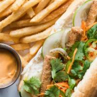 Fried Tofu W/Green Peppers & Onions · Pickled carrots and daikon, cucumber, green onions, cilantro, jalapeño, and mayo. Wrap inclu...