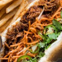 Pulled Pork · Pickled carrots and daikon, cucumber, green onions, cilantro, jalapeño, and mayo. Wrap inclu...
