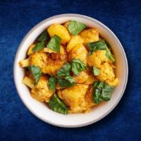 Cauli & Potato Curry  · Indian spiced potato and cauliflower stir fry with blend of spices