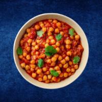 Chickpea Curry · Chickpeas, soaked overnight and simmered to perfection in a gently spiced onion & tomato curry