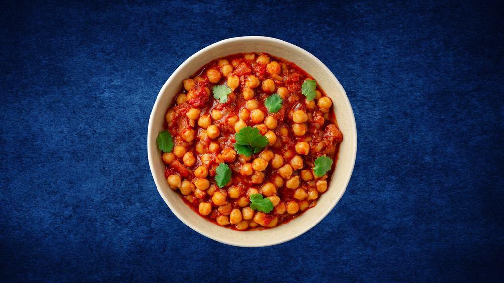 Chickpea Curry · Chickpeas, soaked overnight and simmered to perfection in a gently spiced onion & tomato curry