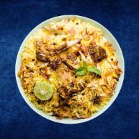 Lamb Deluxe Biryani · Boneless lamb chunks cooked in a special biryani masala curry, layered with imported long gr...