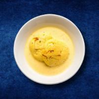 Ras Malai Infusion · Flattened Village cheese patties steeped in spice infused milk