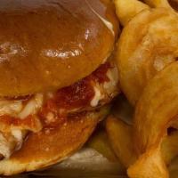 Chicken Parmesan Sandwich · Breaded Chicken Breast smothered with Marinara Sauce and Mozzarella Cheese. Served with Fries.