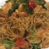 Singapore Noodles · Stir-fried noodles with cabbage, green onion, bean sprouts, chinese greens, and crispy fried...