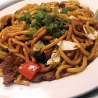 Udon Noodle · Delicious thick noodles cooked with bell pepper, green onion, cabbage, your choice of meat.