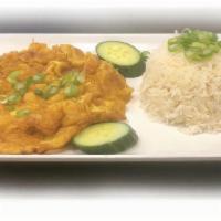 Golden Fried Egg · Egg fried to crispy golden perfection ! with rice, cucumber and green onion