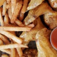 Whole Chicken Wings (10 Pieces) With Fries · Deep-fried un-breaded whole chicken wings seasoned with lemon pepper. Served with fries and ...
