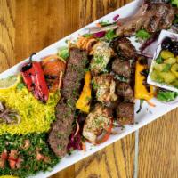 Super Mixed Grill Platter · One skewer each of lamb, chicken, and kofta kabab; one lamb chop piece. Served. served with ...