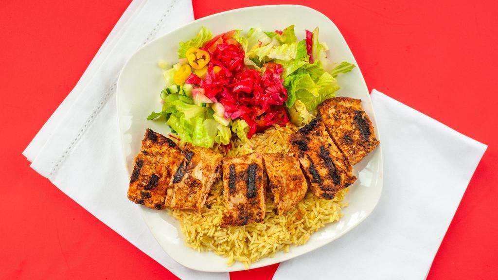 Chicken Kabab · Char-grilled cubed marinated chicken. Served with salad, rice and pita bread.
