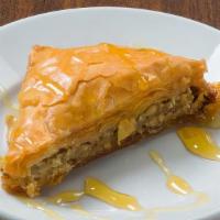 Baklava · Layers of phyllo dough with walnut, pistachios and honey.