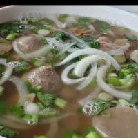 Meatball Pho · Traditional beef soup with rice noodle served with a side of bean sprouts, Thai basil, jalap...