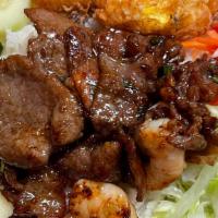 Com Trung  Thịt , Tôm Thap Cam (Combination) · Pork, steamed egg and shrimps . Steamed rice with lettuce, , cucumber, pickled carrots  with...