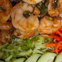 Com Shrimp · Steamed rice with lettuce, cucumber, pickled carrots, with a side of fish sauce.