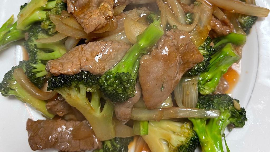 Beef Broccoli · Stir-fried beef with broccoli, carrots and white  onion.