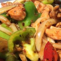 Hot Spicy Chicken · Tender chicken sautéed with lemongrass, bell peppers, and onions in hot sauce.