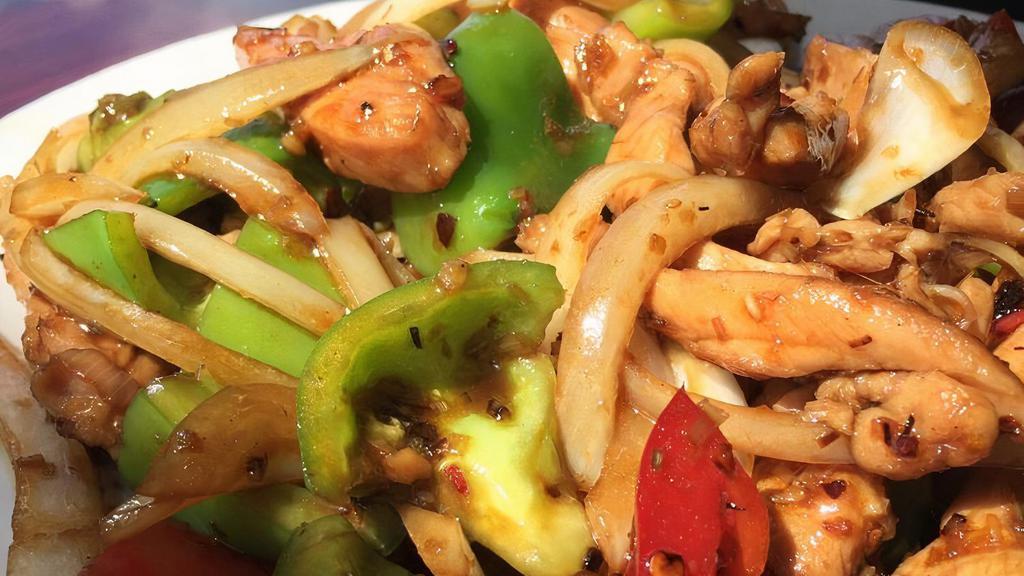 Hot Spicy Chicken · Tender chicken sautéed with lemongrass, bell peppers, and onions in hot sauce.