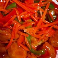 Sweet And Sour Shrimp · Deep fried breaded shrimp in red sweet and sour sauce, carrots, and bell peppers.