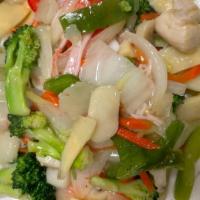 Seafood Delight · Shrimp, squid, scallop, and imitation crab stir-fried with mixed vegetables in a white sauce.