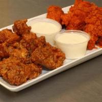 100 Buffalo Wings · Made Fresh! Served with Box of Fries.