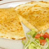 Quesadillas De Harina O Masa De Maiz (Flour Or Corn Masa Quesadilla) · Flour or corn tortillas  fill with cheese served with lettuce and tomatoes.