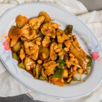 Kung Pao Chicken · Mild. White breast chicken, peanuts mushrooms, bamboo shoots, carrots, celery, bok choy, pea...