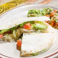 Gringa Vegetariana · Two flour tortillas filled with melted cheese, fresh avocado, tomatoes, and lettuce. Served ...