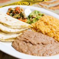 Cheese Quesadilla Dinner · Three quesadillas in flour or corn tortilla with cheese only. Served with rice, beans, sour ...