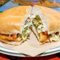 Torta · Mexican style bun filled with your choice of meat, lettuce, tomato, avocado, jalapeno pepper...