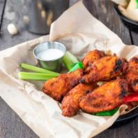 Smokin’ Wings · 1 lb. of wings with your choice of tossed in Spicy Buffalo or Chipotle BBQ wing sauce. Serve...