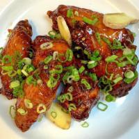 Maple Red Pepper Glaze · We take Uncle Dougie's wicked good no-fry wing marinade, add some organic maple syrup and th...