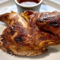 Roasted Chicken Dinner · Half broasted chicken finished on the grill and served with a side salad. Choice of wing sau...