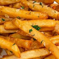 Seasoned Fries · Crispy French fries tossed in kosher salt and cracked black pepper.