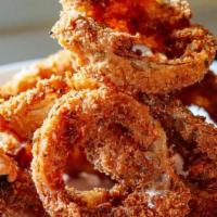 Onion Rings · Jumbo hand-breaded onion rings full of crunch and flavor served with Horseradish Cream or Ru...