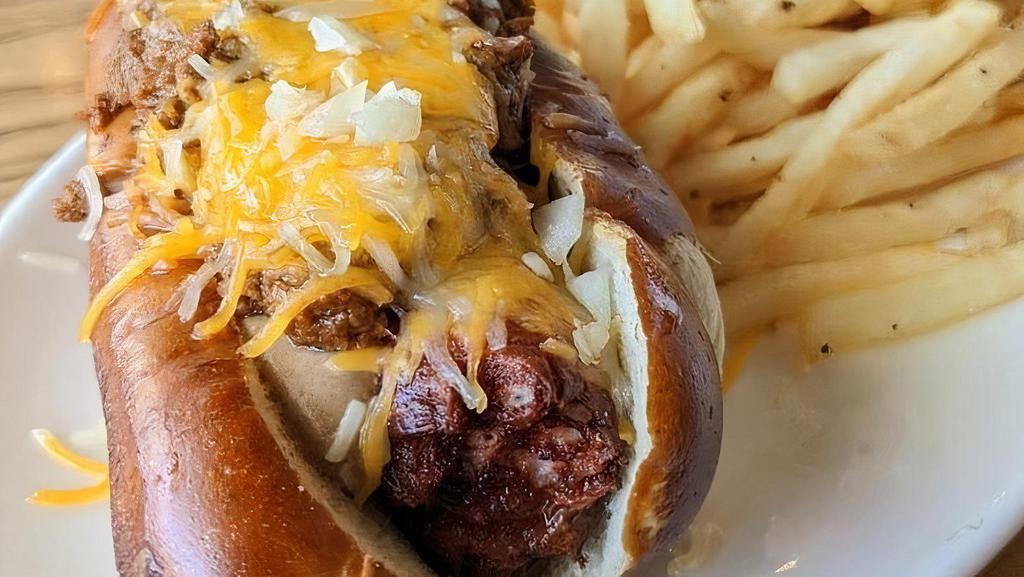 Coney Dog · All Beef Hot Dog topped with Detroit Coney Sauce, Diced Onion, Cheddar, & Stadium Mustard served on a Pretzel Bun. Served with a side of Fries or Tots.