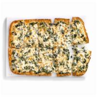 Flatbread Spinach Alfredo · Spinach blended with creamy Alfredo Sauce topped with 100% Real Cheese on crispy flatbread c...