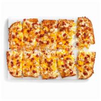 Flatbread Chicken Bacon Club · Crispy flatbread crust topped with 100% Real Cheddar Cheese, Premium Chicken, Bacon and Brus...