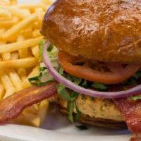 Salmon Burger · housemade Atlantic salmon patty, bacon, lettuce, tomato, onion, grain mustard aioli, brioche.