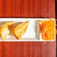 Crab Rangoon (5) · Fried wonton filled with crab meat, celery and cream cheese.